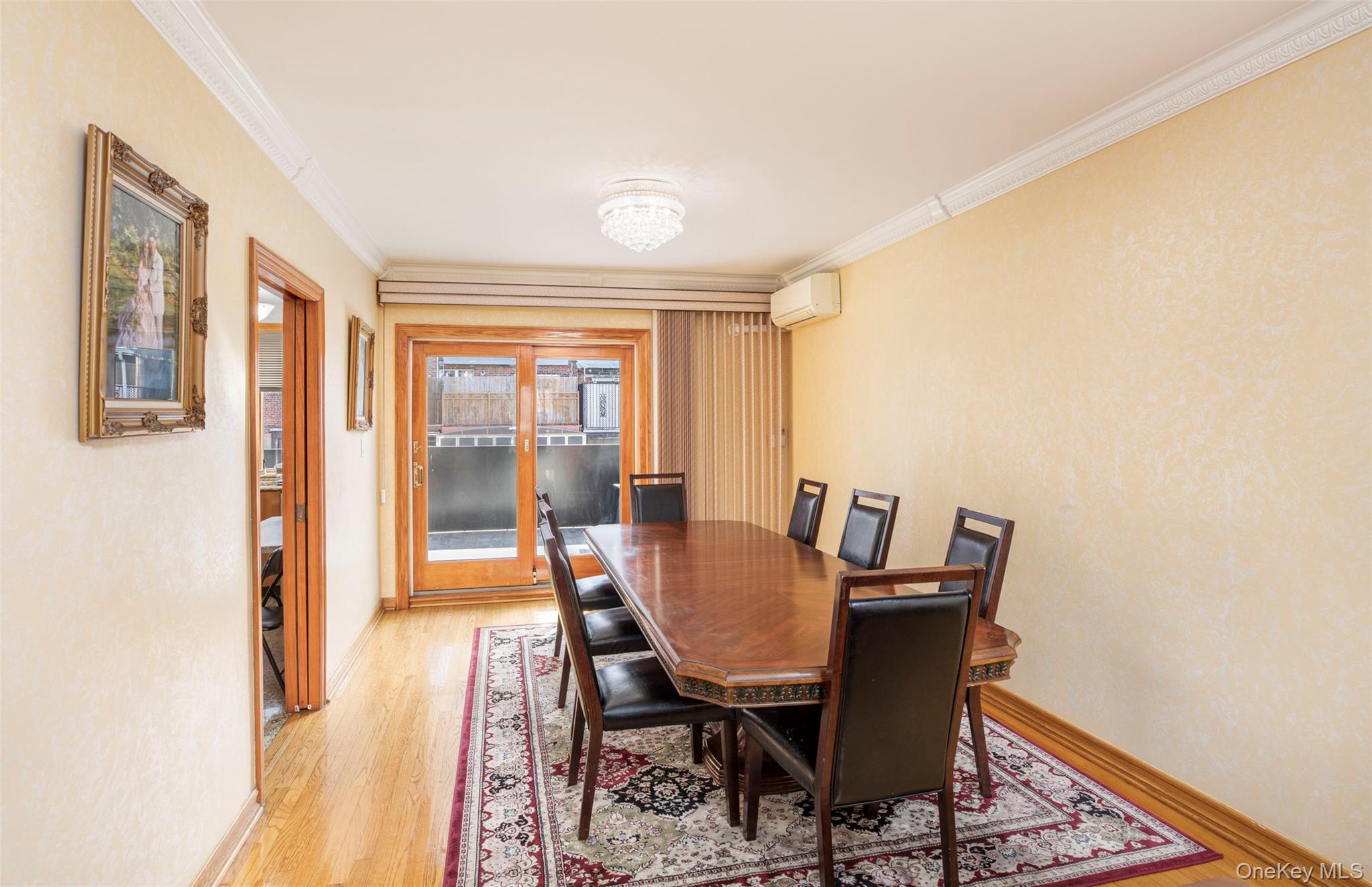 99-64 65th Avenue Queens, NY 11374 - Photo 5 of 22 a view of a dining room with furniture and wooden floor
