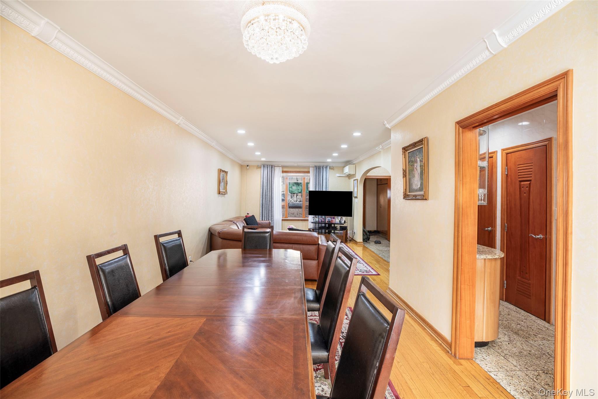 99-64 65th Avenue Queens, NY 11374 - Photo 6 of 22 a view of a livingroom with furniture and a flat screen tv