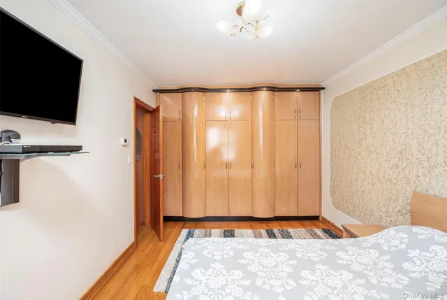 a view of a room with a flat screen tv