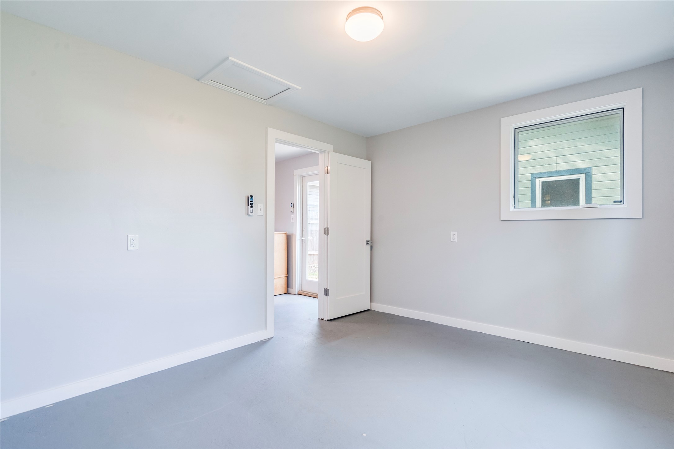 2314 Santa Rosa Street Austin, TX 78702 - Photo 19 of 29 A well-lit, versatile room with a clean, modern aesthetic, ready for custom finishes.