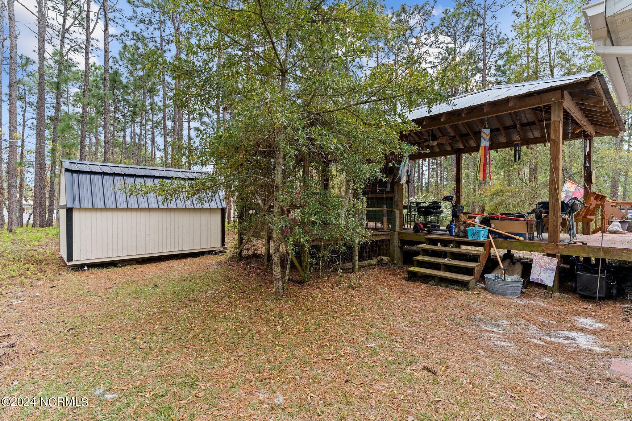 1310 Maple Road Southport, NC 28461 - Photo 38 of 50 SideYardMaple