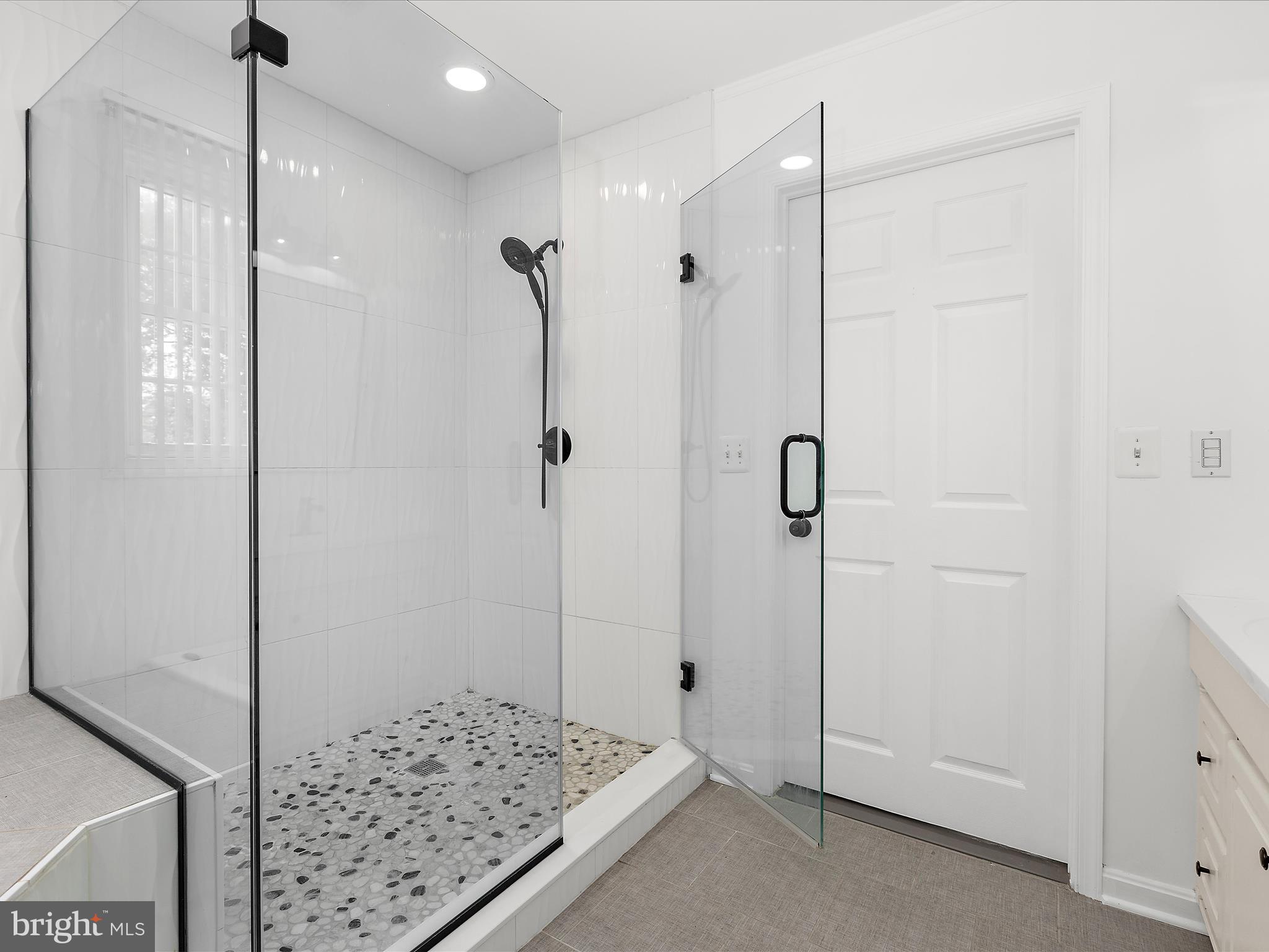 8475 Sexton Road Pasadena, MD 21122 - Photo 20 of 58 a bathroom with a shower and a sink