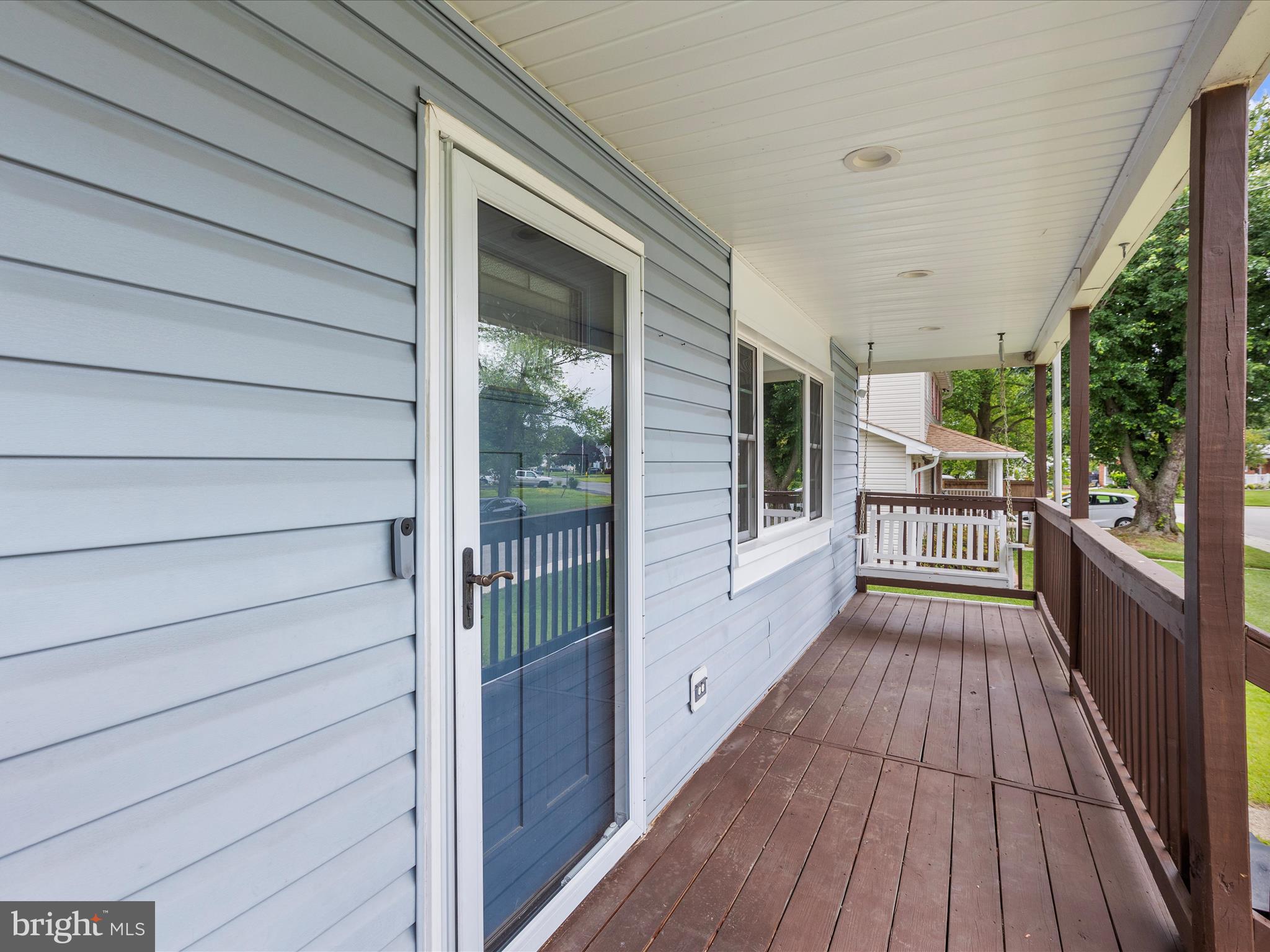 8475 Sexton Road Pasadena, MD 21122 - Photo 3 of 58 a view of a balcony with wooden floor