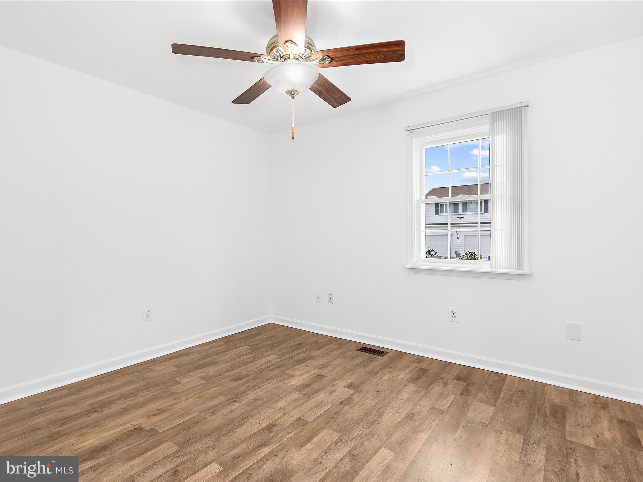 8475 Sexton Road Pasadena, MD 21122 - Photo 34 of 58 an empty room with a window and a fan