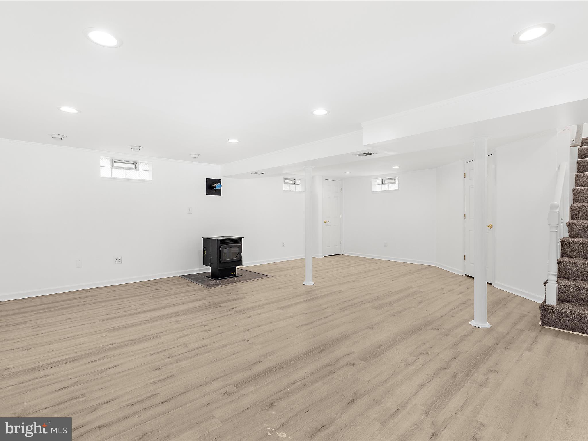 8475 Sexton Road Pasadena, MD 21122 - Photo 40 of 58 a view of empty room with wooden floor