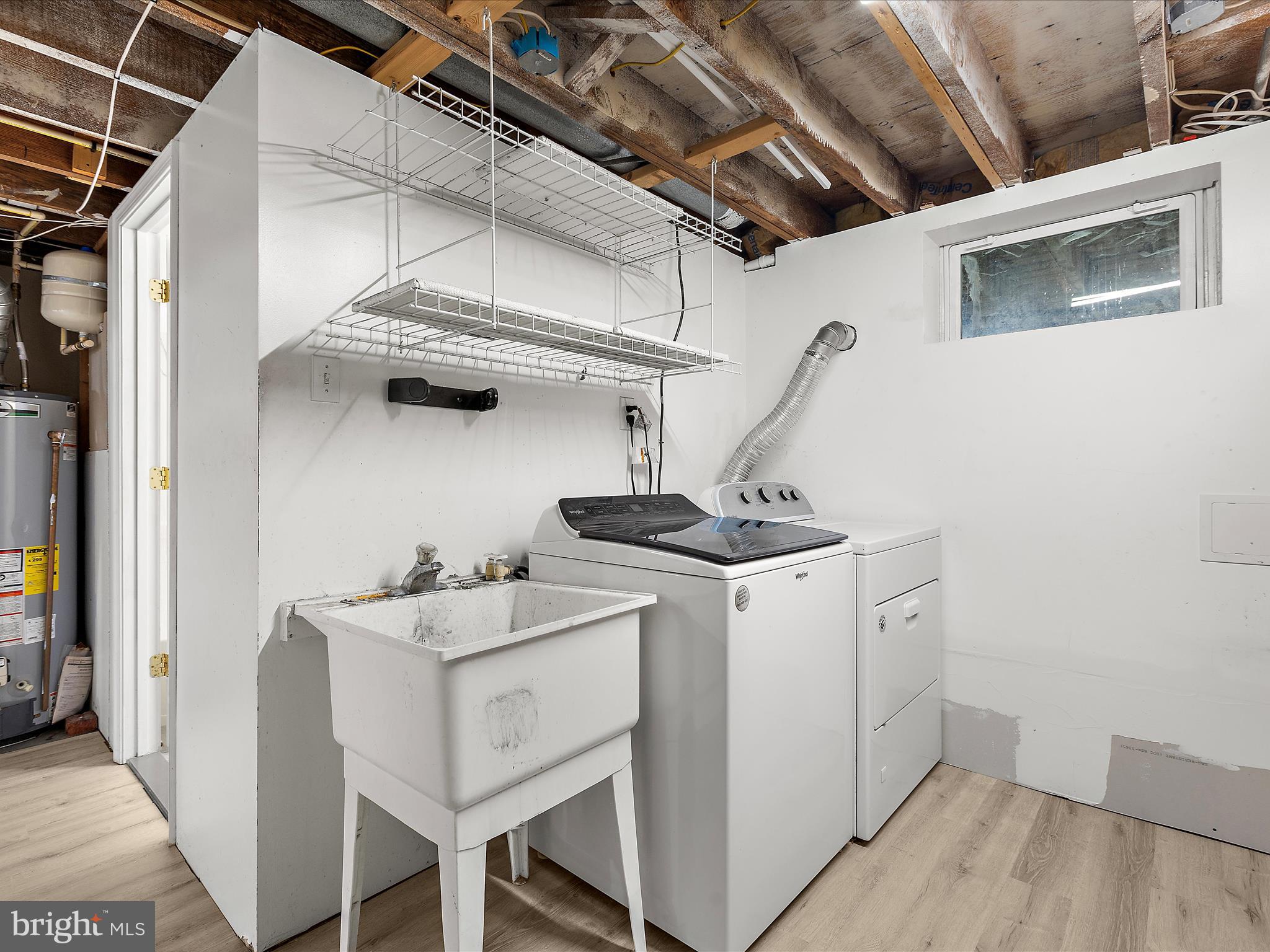8475 Sexton Road Pasadena, MD 21122 - Photo 49 of 58 a utility room with dryer and washer