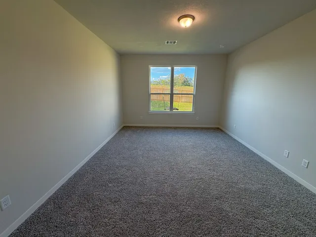 an empty room with a window