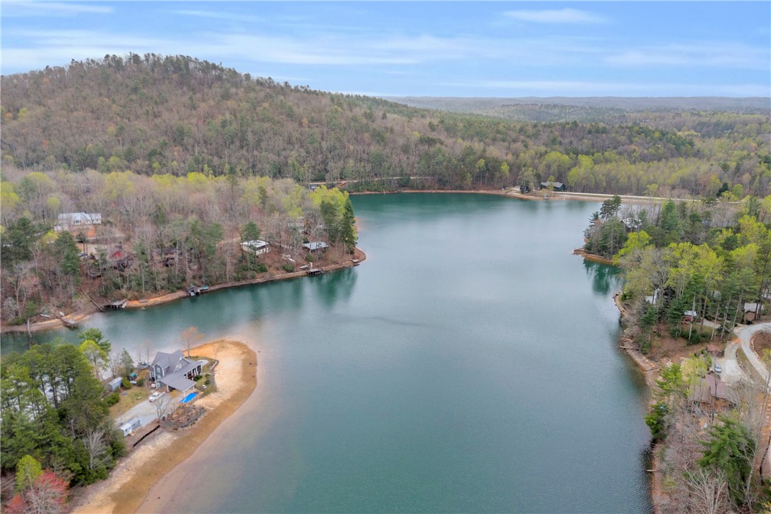 115 Little Stakey Rd Mountain Rest Mountain Rest, SC 29664 - Photo 36 of 38 Perched on the waterfront, this home offers tranquil lake views and easy access to the water's edge.