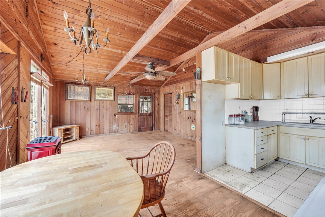 115 Little Stakey Rd Mountain Rest Mountain Rest, SC 29664 - Photo 10 of 38 This inviting space features natural wood accents throughout, creating a warm and rustic ambiance.