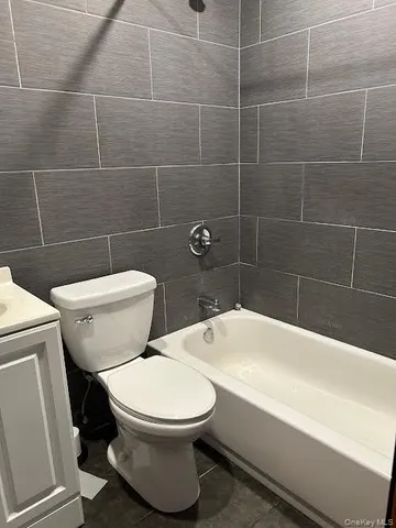 a kitchen with cabinets and appliances