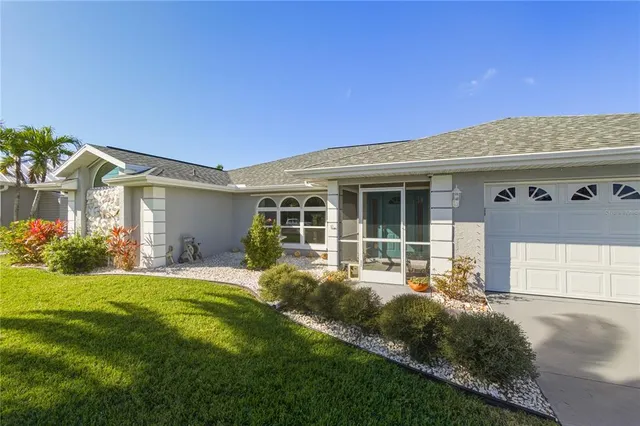 a view of a door and chair in the balcony