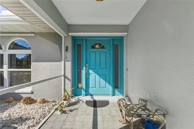 a view of a livingroom with furniture and window