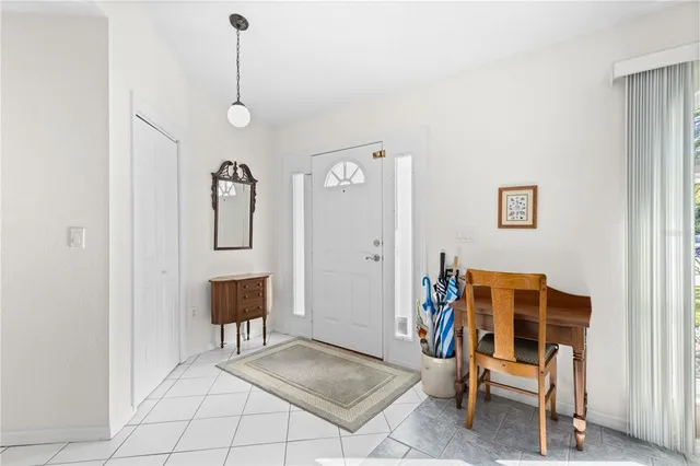 a view of a livingroom with furniture and a window
