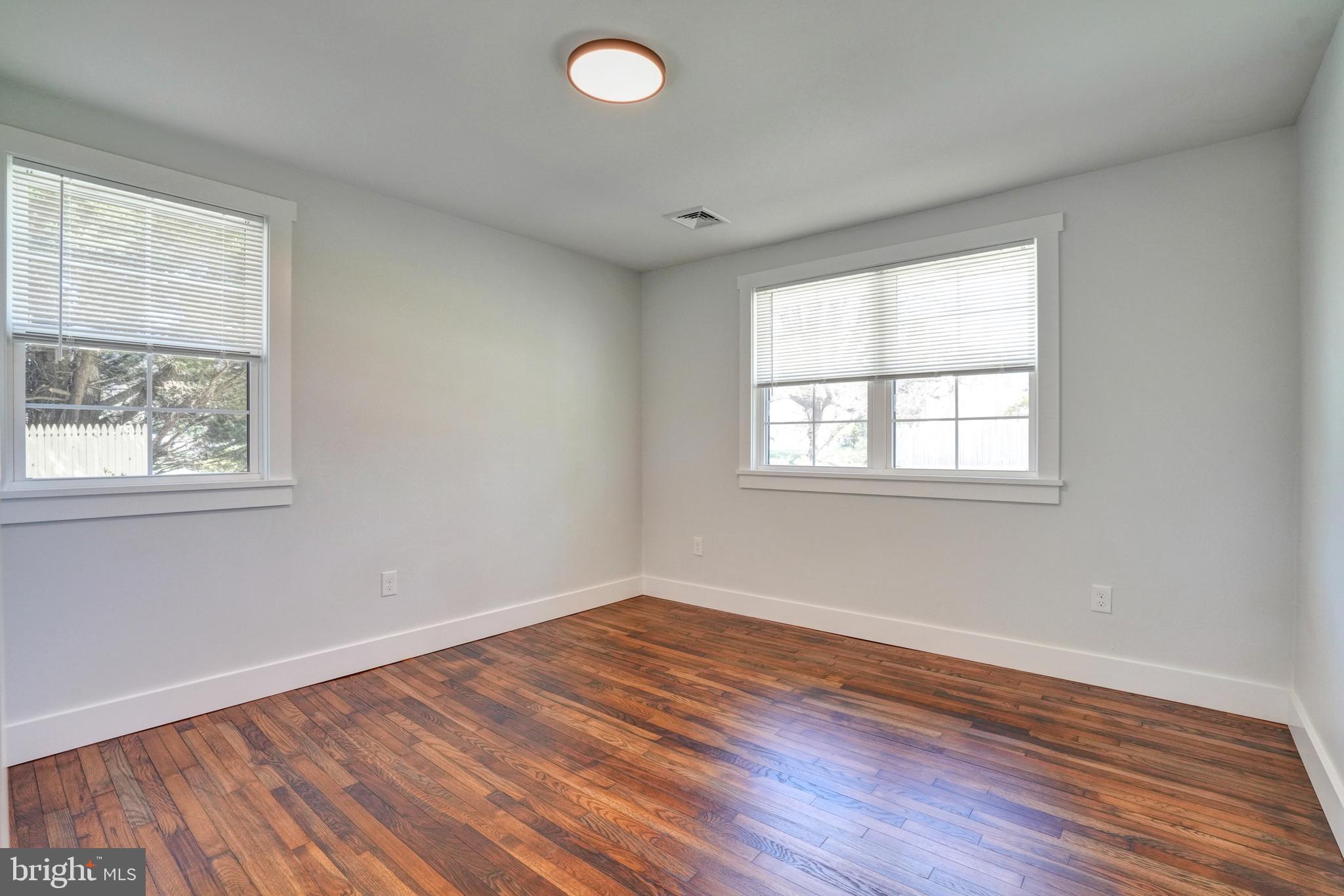 1312 Ship Road West Chester, PA 19380 - Photo 19 of 50 a view of empty room with wooden floor and fan