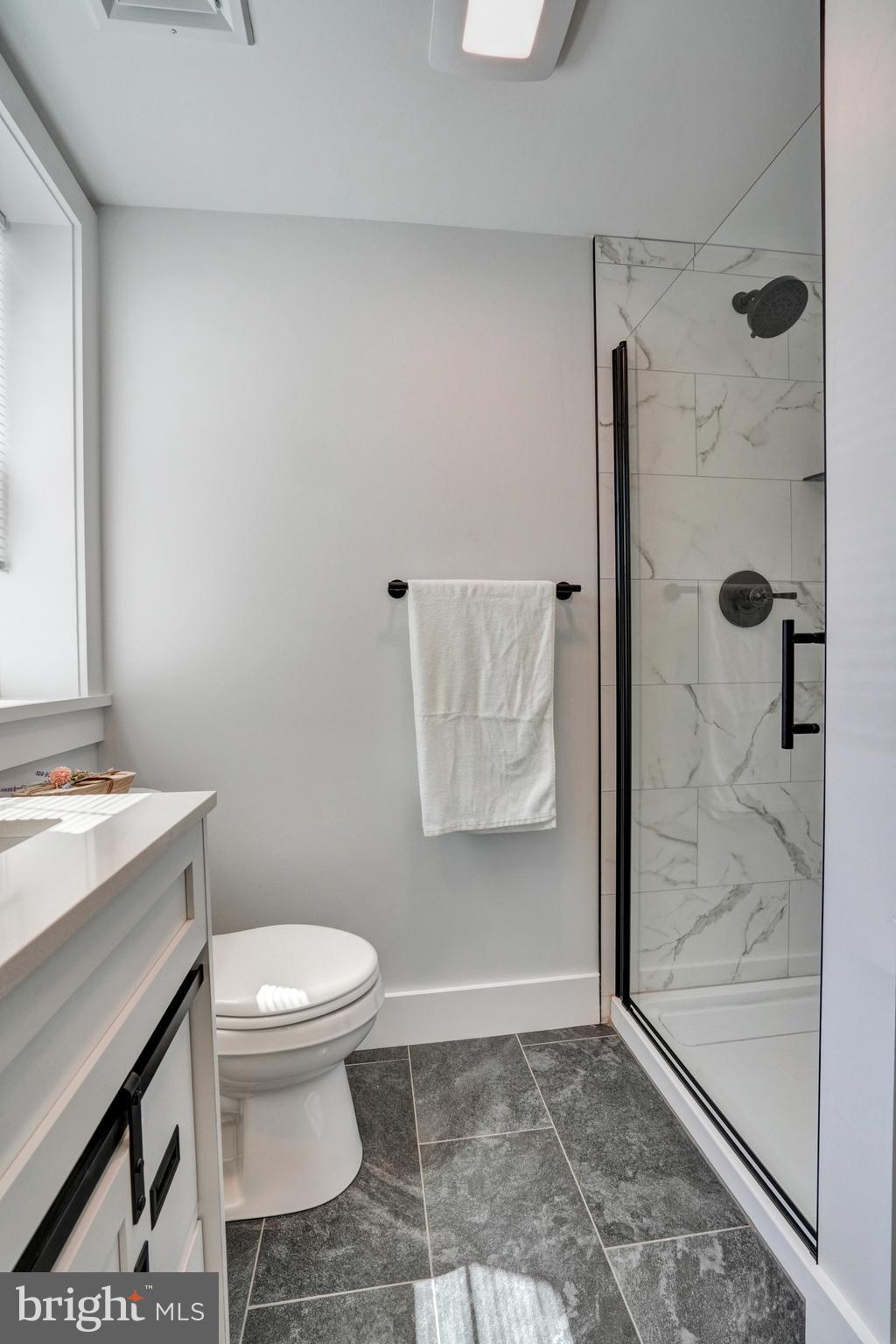 1312 Ship Road West Chester, PA 19380 - Photo 26 of 50 a bathroom with a toilet and a shower