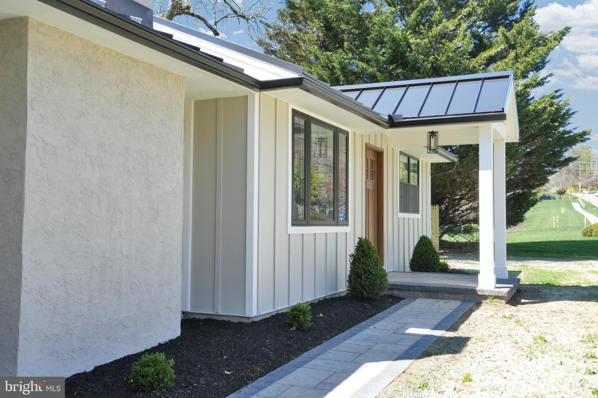1312 Ship Road West Chester, PA 19380 - Photo 3 of 50 a view of a house that has a small deck and a patio