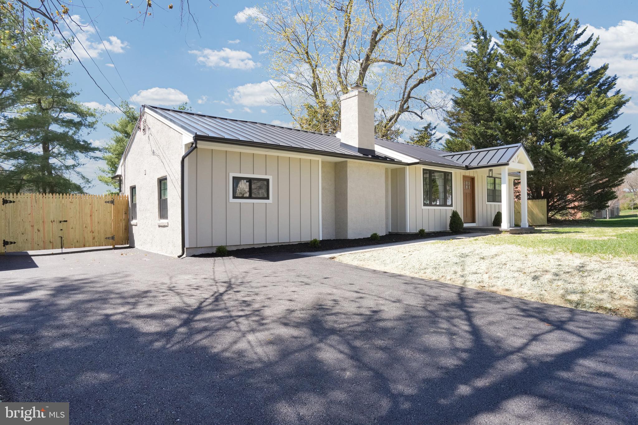 1312 Ship Road West Chester, PA 19380 - Photo 4 of 50 a view of a house with a yard and garage