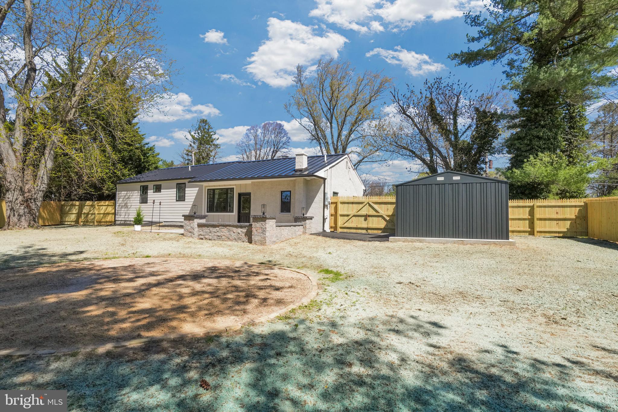 1312 Ship Road West Chester, PA 19380 - Photo 45 of 50 a front view of a house with a yard and garage