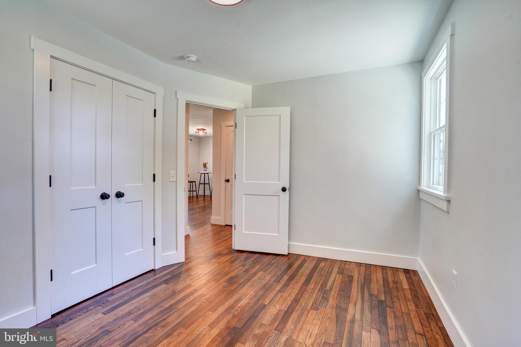 1312 Ship Road West Chester, PA 19380 - Photo 7 of 50 a view of a hallway with wooden floor