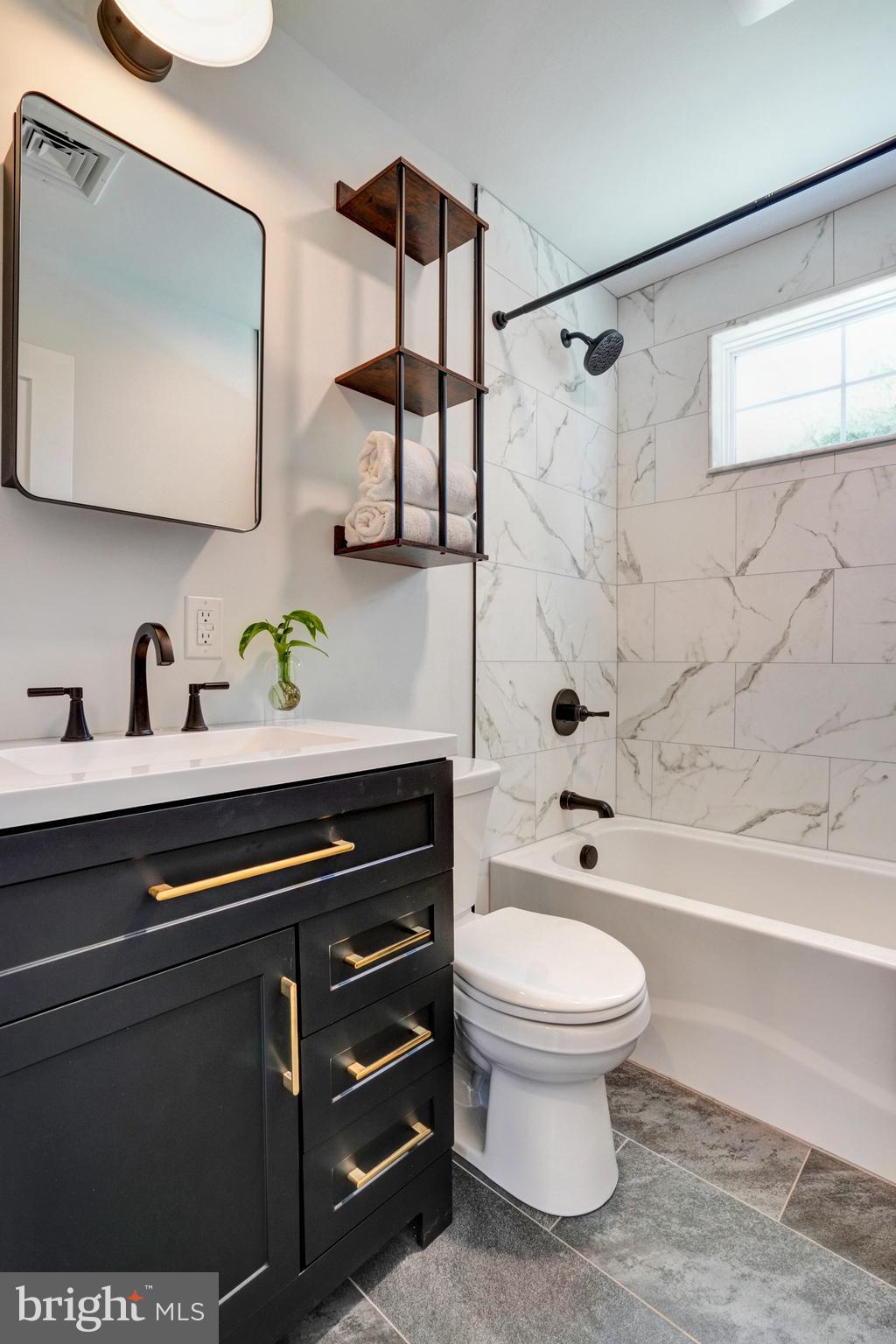 1312 Ship Road West Chester, PA 19380 - Photo 9 of 50 a bathroom with a sink a toilet and a bathtub