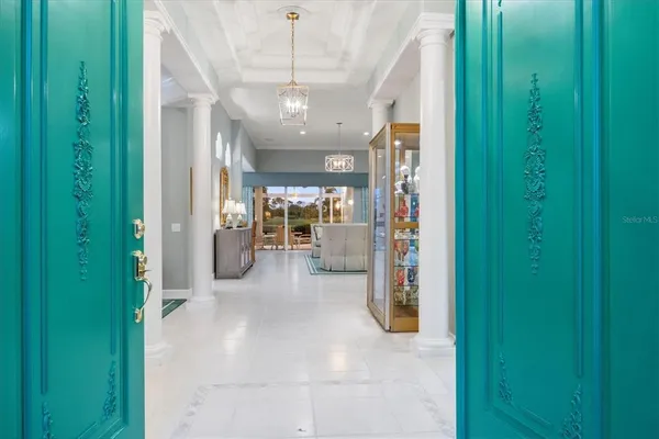 a view of a hallway with a furniture