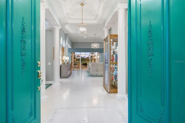 a view of a hallway with a furniture