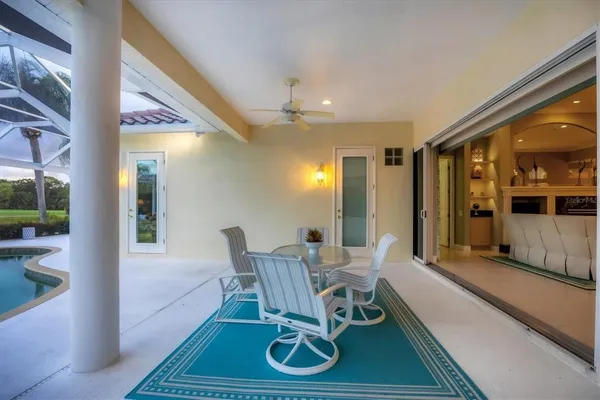 a view of a lake with houses in the back