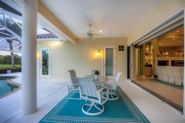 a view of a lake with houses in the back