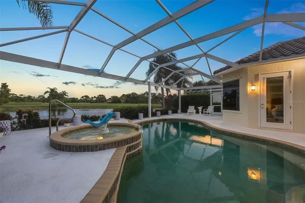 a view of a swimming pool with a patio