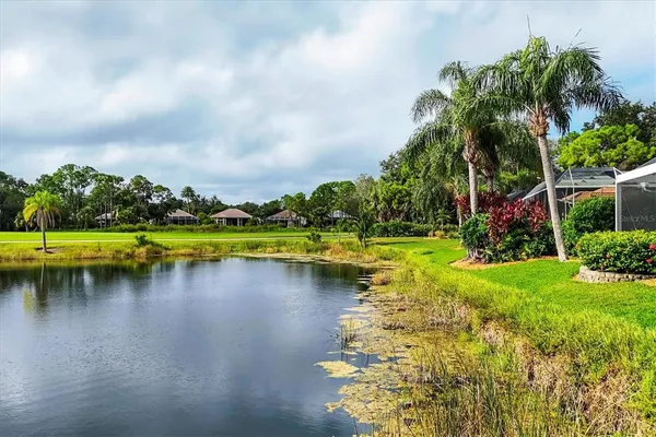 an aerial view of residential house with outdoor space and swimming pool