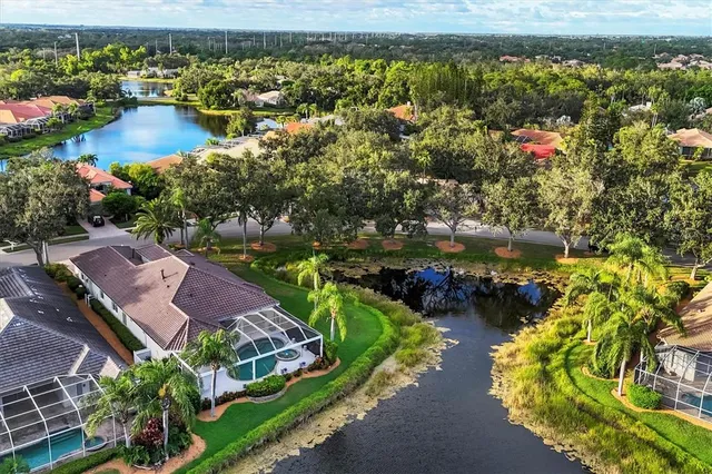 a view of a lake with a yard