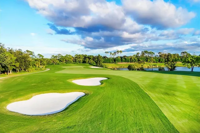 a view of a chair and tables in the balcony