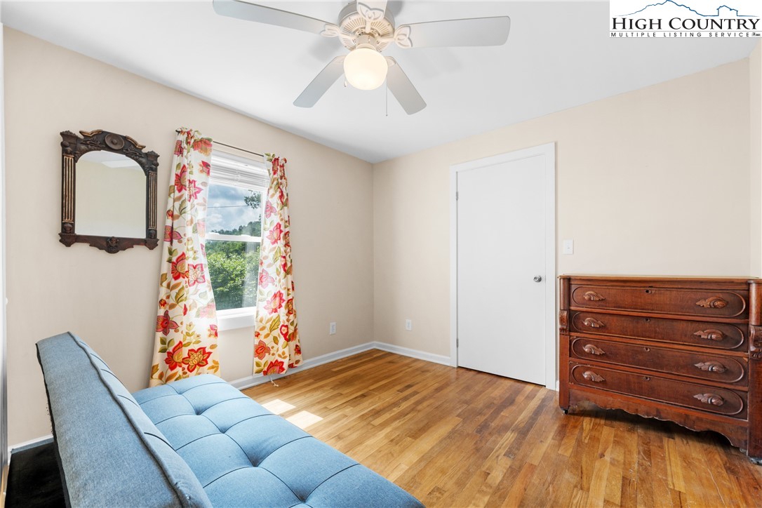 261 Tumbling Brook Road Banner Elk, NC 28604 - Photo 25 of 39 a bedroom with a bed and a dresser