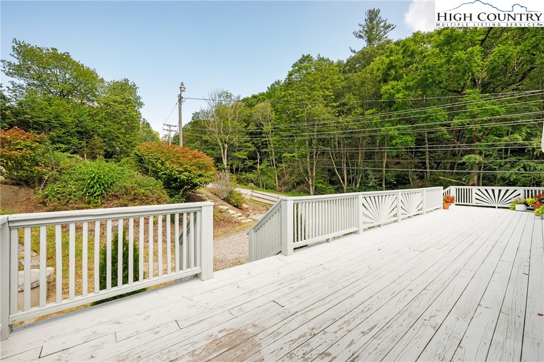 261 Tumbling Brook Road Banner Elk, NC 28604 - Photo 32 of 39 a view of balcony with wooden floor and fence