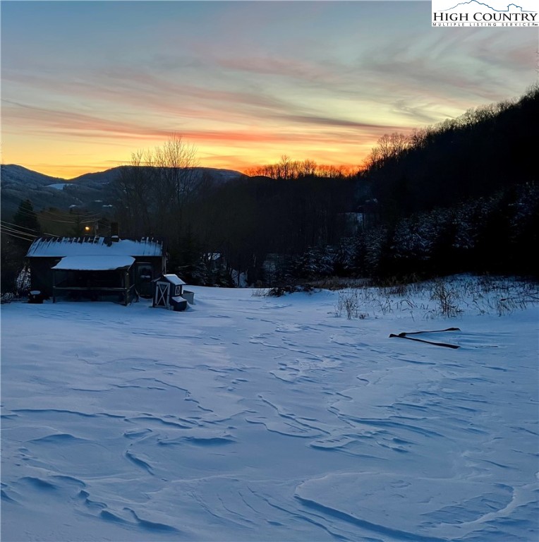 261 Tumbling Brook Road Banner Elk, NC 28604 - Photo 6 of 39 a view of swimming pool outdoor seating