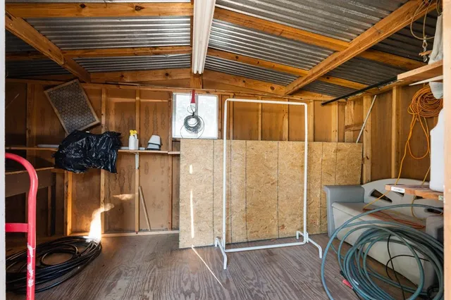 an outdoor view of water building with trees