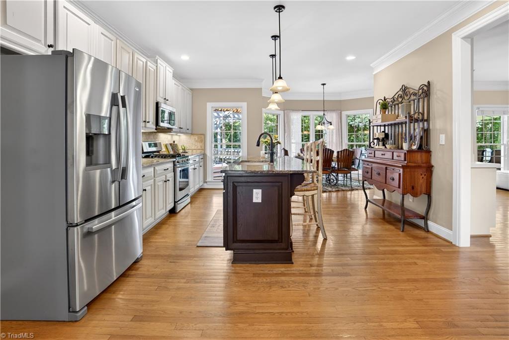 8508 Rosedale Drive Oak Ridge, NC 27310 - Photo 14 of 50 Stainless, space, and a flow made for hosting.