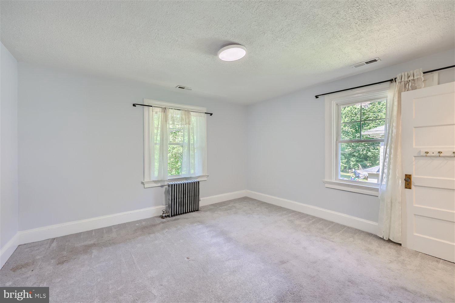 105 East Maple Road Linthicum Heights, MD 21090 - Photo 25 of 37 an empty room with windows