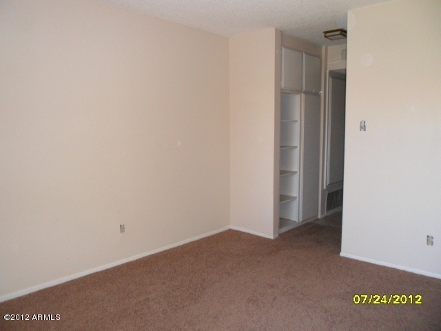 5525 East Thomas Road, Unit F15 Phoenix, AZ 85018 - Photo 13 of 17 a view of an empty room
