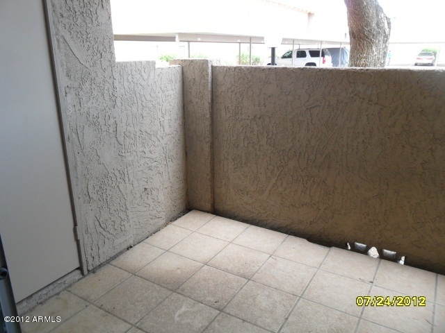 5525 East Thomas Road, Unit F15 Phoenix, AZ 85018 - Photo 15 of 17 a view of a refrigerator