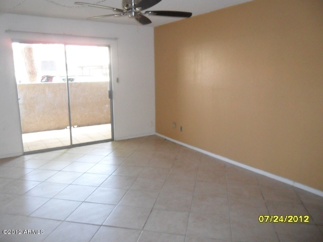5525 East Thomas Road, Unit F15 Phoenix, AZ 85018 - Photo 4 of 17 a view of a room with an empty space