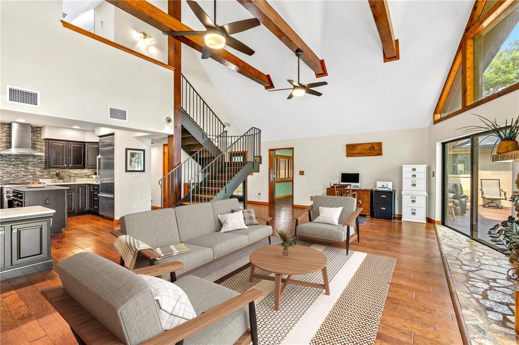 444 Lake Road Lake Mary, FL 32746 - Photo 8 of 63 Beautiful beams add character to this already amazing living room