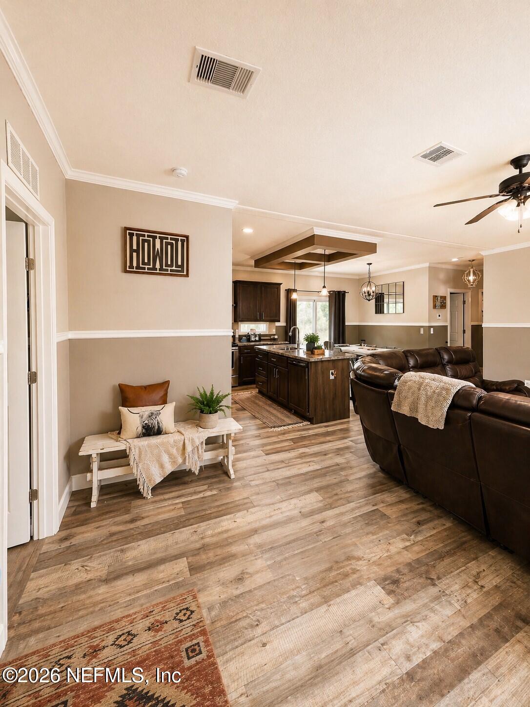124 Jack Road Palatka, FL 32177 - Photo 10 of 18 a living room with furniture window and wooden floor