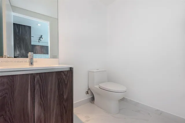 a bathroom with a sink and a toilet