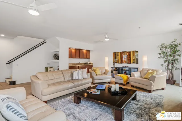 a kitchen with stainless steel appliances granite countertop wooden cabinets a sink and dishwasher