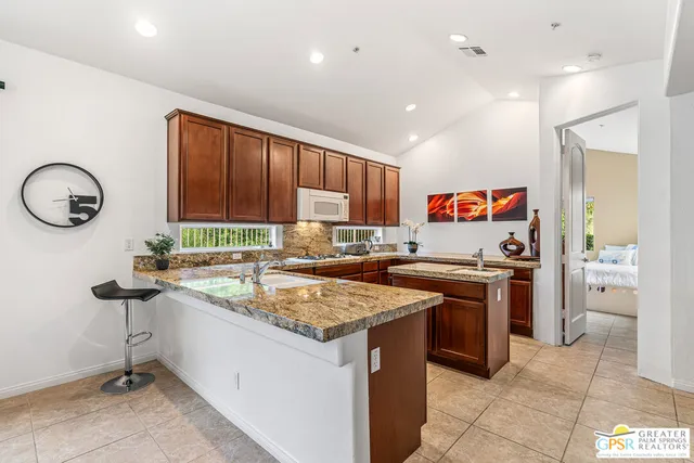 a bathroom with a tub and a window