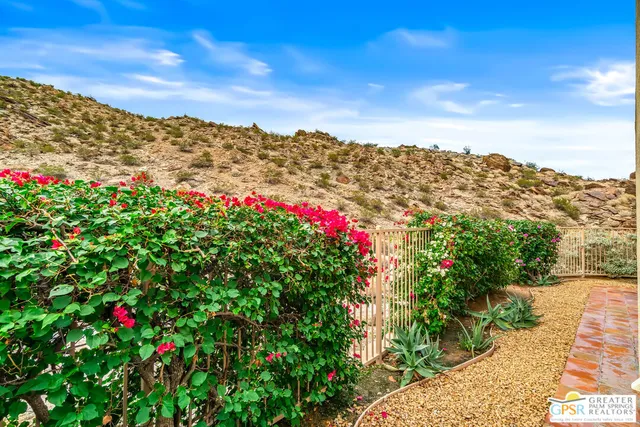 a picture of a bathroom with a shower