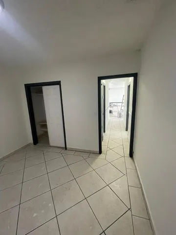 a view of a utility room with windows