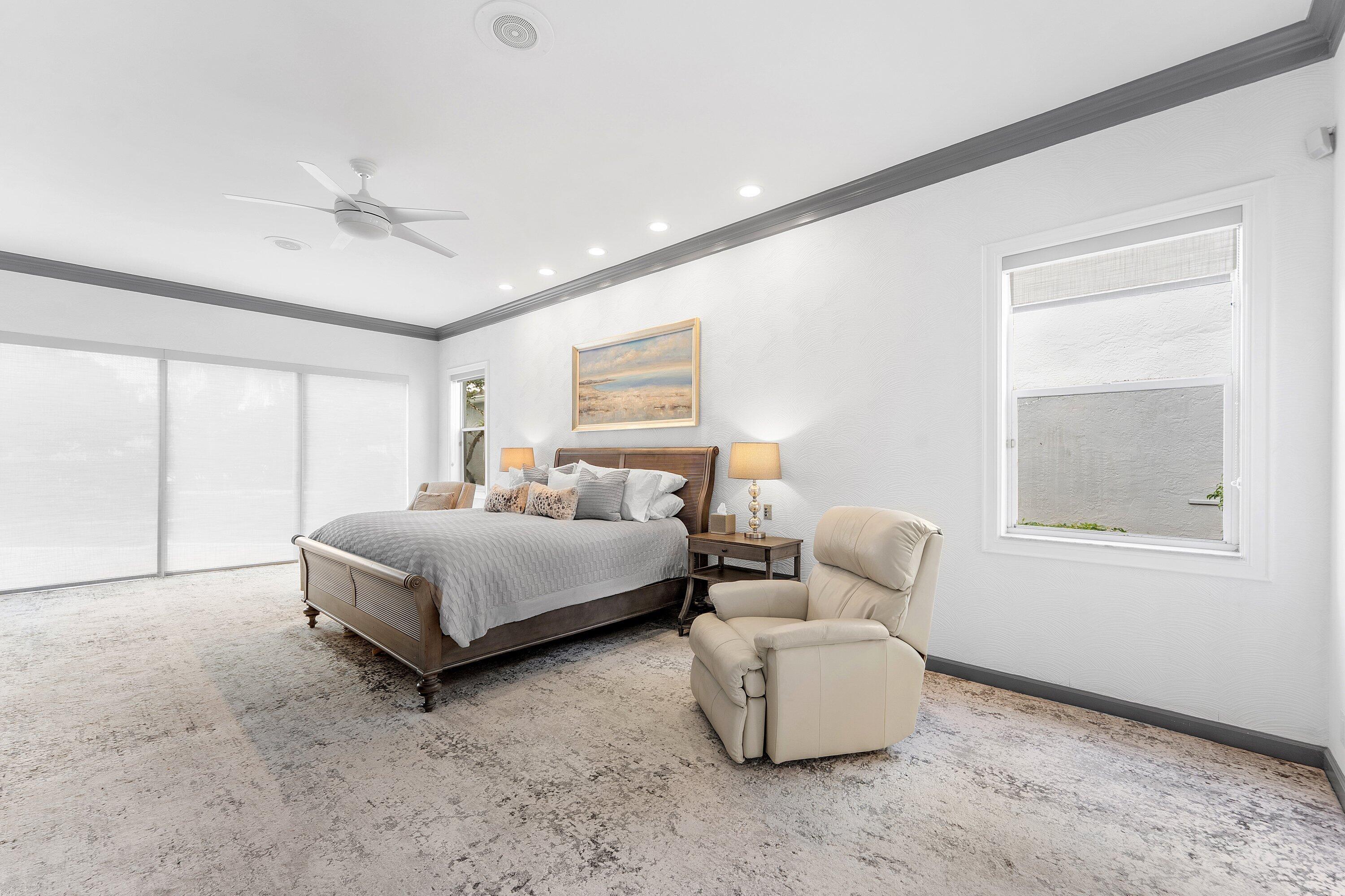 5863 Waterford Boca Raton, FL 33496 - Photo 15 of 90 a bedroom with a bed and a couch