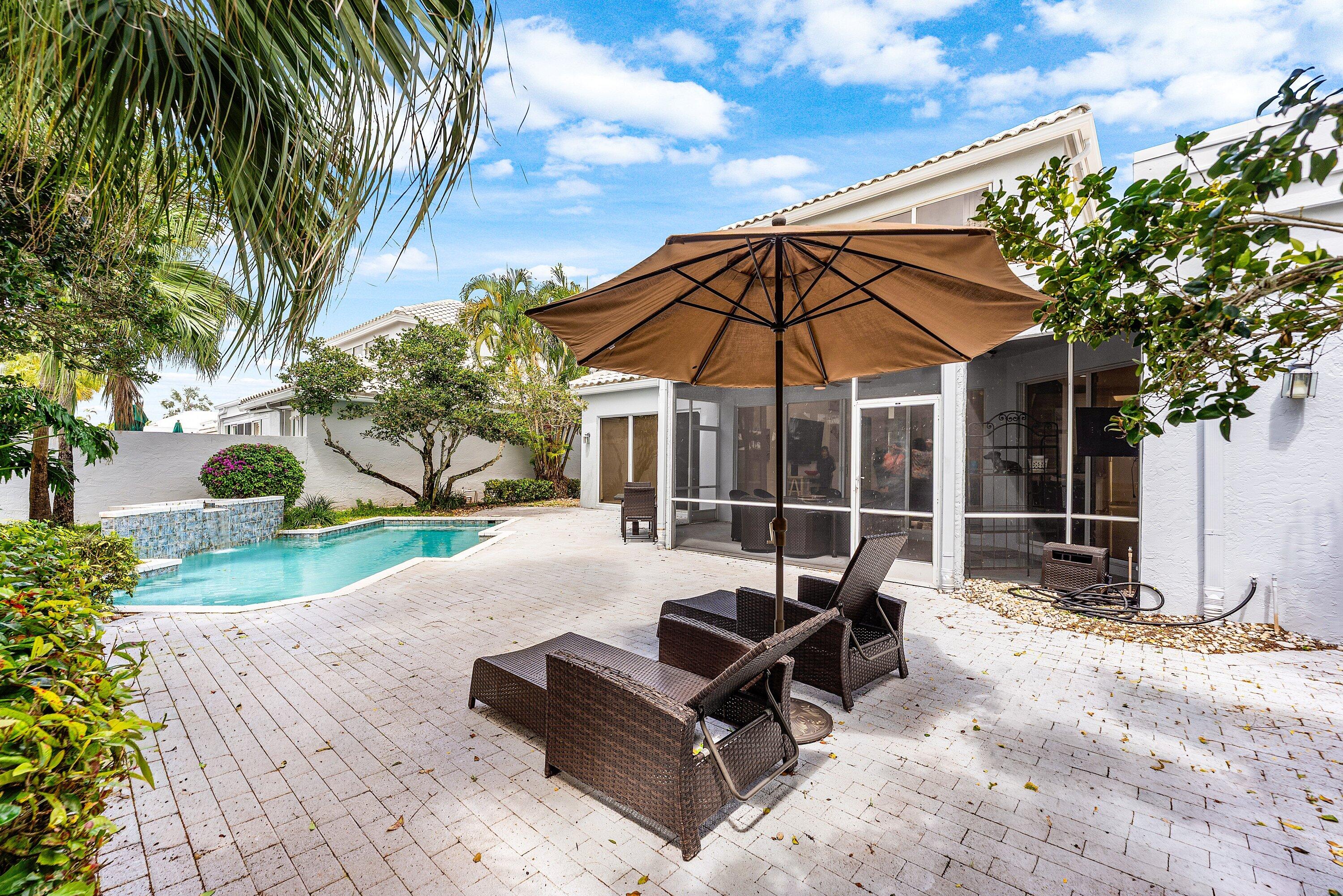 5863 Waterford Boca Raton, FL 33496 - Photo 35 of 90 a view of a house with backyard and sitting area
